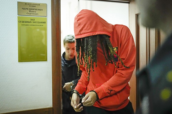 WNBA star and two-time Olympic gold medalist Brittney Griner leaves a courtroom after a hearing, in Khimki just outside Moscow, Russia, Friday, May 13, 2022. Griner, a two-time Olympic gold medalist, was detained at the Moscow airport in February after vape cartridges containing oil derived from cannabis were allegedly found in her luggage, which could carry a maximum penalty of 10 years in prison. (Alexander Zemlianichenko/AP)