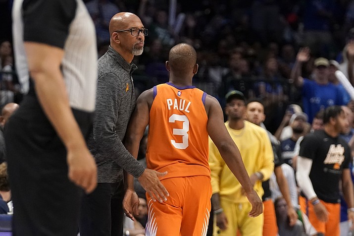 Phoenix Suns head coach Monty Williams, left, greets, Chris Paul (3) at the bench after Paul fouled out in the second half of Game 4 of a second-round playoff series against the Dallas Mavericks, Sunday, May 8, 2022, in Dallas. (Tony Gutierrez/AP)