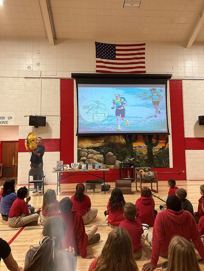 “Finding Gobi” author, motivational speaker and international ultra-marathon runner Dion Leonard, an Australian native who now lives in Scotland, with extended visits to Prescott, Arizona, visits at Sacred Heart Catholic School in Prescott. He shares the story of his friendship with a stray dog he named “Gobi” who he rescued during his 2016, ultra marathon across the Gobi Desert in China. The dog paced him for many miles of the race — and across a raging snowmelt river - before he got a motorized escort to the finish. (Nanci Hutson/Courier)