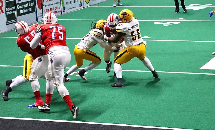 NAZ Wranglers running back Israel Tucker with the ball versus the Tucson Sugar Skulls May 14, 2022. (Wranglers/Courtesy photo)