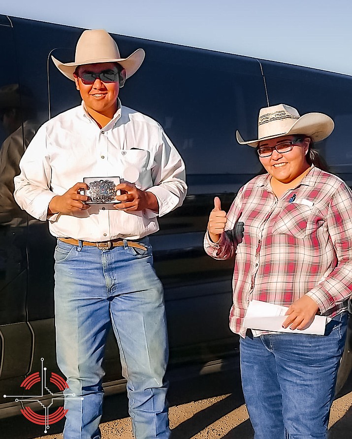 Navajo Technical University student Rooster Yazzie and
NTU Rodeo Coach Nicole Pino visit during a recent event. Yazzie, along with Hiyo Yazzie have qualified for the 2022 College National Finals Rodeo. (Photo/NTU)