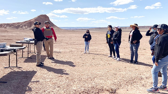 Navajo women participating in the Lioness Project, put on by the Navajo Police Training Academy in partnership with Dine College, learn handgun safety during range day. (Photo/Navajo Police Department)