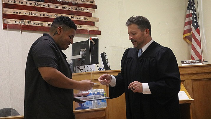 Judge Jeffrey Singer presides at a graduation ceremony for the City of Kingman’s Veterans Treatment Court. He gave his annual report to Kingman City Council this week, and discussed efforts to continue promoting and implementing options for veterans post-graduation. (Kingman Miner file photo)