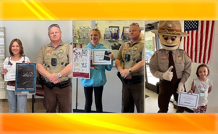 LEFT: Yavapai County Sheriff’s Office Lt. Mike Dannison presented the 7th – 12th Grade Grand Prize to Kathryn Hutchinson, age 13, from Bradshaw Mountain Middle School in Dewey.

CENTER: Yavapai County Sheriff’s Office Lt. Mike Dannison presented the Pizza Box Topper category award to Kinsey Murphy, from Heritage Middle School in Chino Valley.

RIGHT: Yavapai County Sheriff’s Office Deputy Do-Right presented an honorable mention award to Franklin Phonetic School student Olivia Rosson.
(Photos MatForce and YCSO/Courtesy)