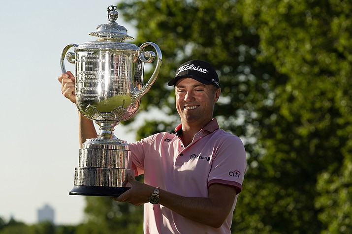 Justin Thomas holds the Wanamaker Trophy after winning the PGA Championship tournament in s playoff against Will Zalatoris at Southern Hills Country Club, Sunday, May 22, 2022, in Tulsa, Okla. (Eric Gay/AP)