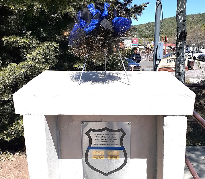 On May 15, during a ceremony for Peace Officer Memorial Day a new plaque was unveiled at Monument Park. (Submitted photo)