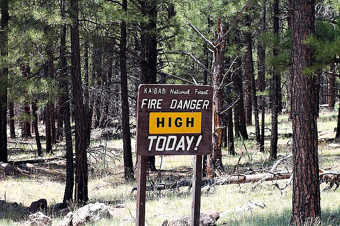 Signs like this one located through the Kaibab National Forest alert visitors to the prevailing fire danger of the day. (Photo/WGCN)