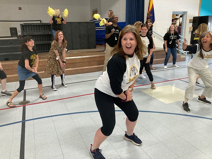 Departing Abia Judd Principal Stephanie Hillig treats her 500-some pre-K to fourth grade students to a lively, all-faculty dance to pop artist Justin Timberlake’s song, “I Can’t Stop the Feeling.” (Nanci Hutson/Courier)