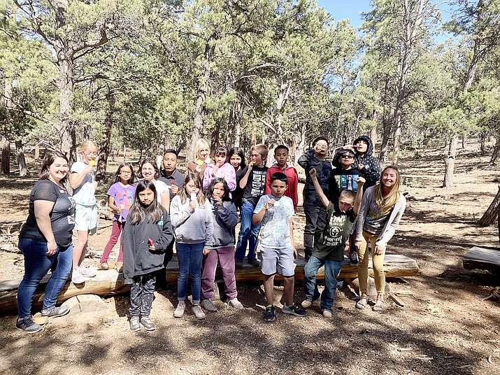 Carolyn Harmon’s fourth grade class and the parents of winning students of the Coconino County Water Ethics Competition enjoy celebratory popsicles after the awards ceremony. (Submitted photo)