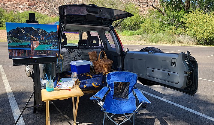 A Plein Air Painting by Williamson Tapia in a tailgate setting, ready for the event. (courtesy of SAC)