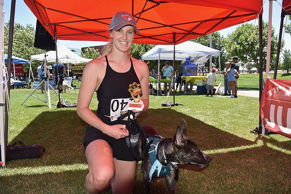 Third place winner of the Best Trick or Talent contest, Gooseberry with owner Ocoee Wilson at WOOFstock at Prescott Valley Civic Center on Saturday, June 11, 2022. (Bertel/Courier)