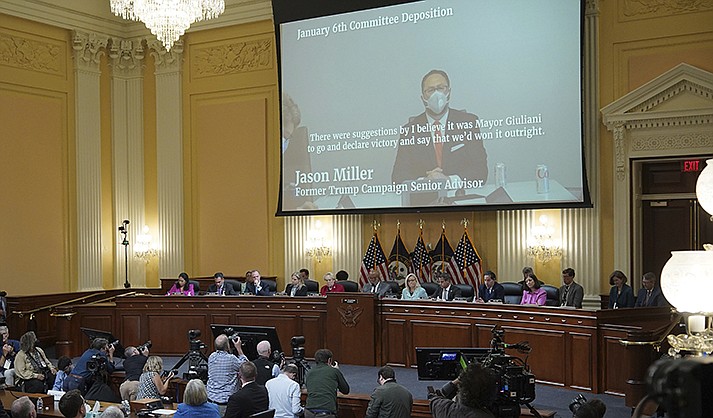 A video of  Jason Miller speaking is displayed as the House select committee investigating the Jan. 6 attack on the U.S. Capitol continues to reveal its findings of a year-long investigation, at the Capitol in Washington, Monday, June 13, 2022. (Mandel Ngan/Pool via AP)