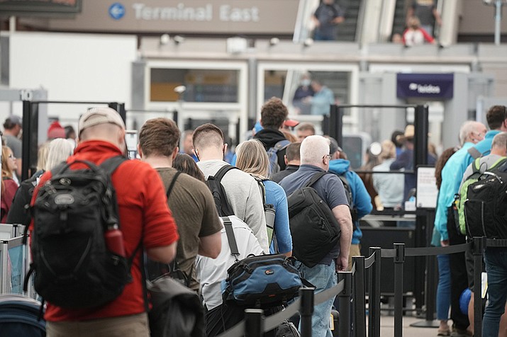 U.S. airlines canceled high numbers of flights for a second straight day on Friday as they tried to recover from storms while accommodating growing crowds of summer vacationers.