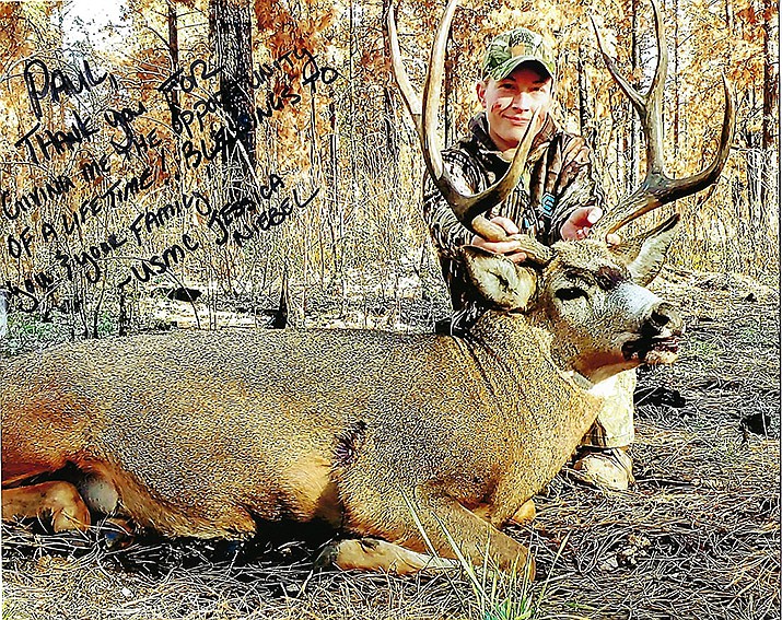This is the signed photo that Marine Corps vet Jessica Neibel presented to Paul Lyells after he had donated his early Kaibab deer tag to the Arizona Elk Society Heroes Rising Outdoors Program, which gave it to Neibel. (Courtesy photo)