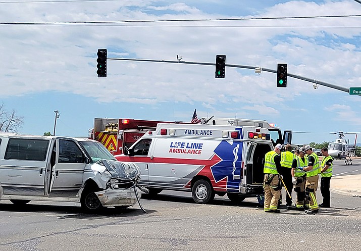Four people were hurt in a two-vehicle collision, which also involved a bicyclist, in Chino Valley on Wednesday, June 22, 2022. Traffic on southbound Highway 89 was diverted onto Road 2 South for about an hour as paramedics treated the injured and a Native Air helicopter landed. (CVPD/Courtesy)