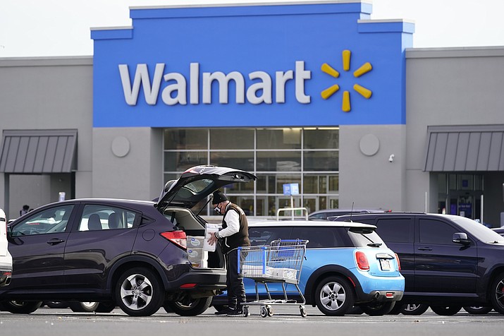 Shown is a Walmart location in Philadelphia, Wednesday, Nov. 17, 2021. Walmart, the nation’s largest retailer, on Wednesday, June 22, 2022, is expanding its healthcare coverage of so-called doula services beyond its workers in Georgia to Louisiana, Indiana and Illinois in an effort to address racial inequities in maternal care. With this move, workers can take advantage of financial support to cover care by doulas— experts who are trained to help support mothers through the labor process and delivery of the child _ up to $1,000 per pregnancy. (Matt Rourke/AP)
