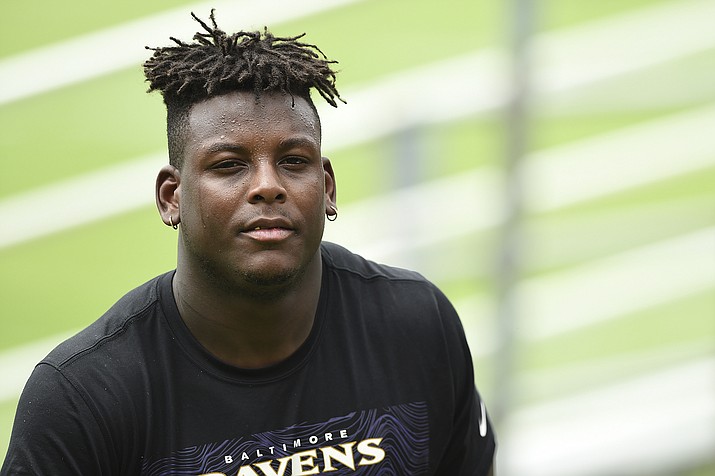Baltimore Ravens rookie linebacker Jaylon Ferguson walks off the field after an NFL Football rookie camp, Saturday, May 4, 2019, in Owings Mills, Md. Ravens linebacker Jaylon Ferguson has died at age 26, his agent confirmed Wednesday, June 22, 2022. (Gail Burton/AP, File)
