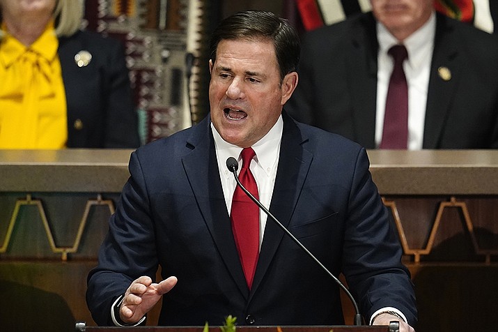 Gov. Doug Ducey gives his state of the state address at the Arizona Capitol, Monday, Jan. 10, 2022, in Phoenix. The governor Tuesday removed $3.6 million earmarked for hyperbaric treatment for veterans from the state budget with a line item veto. (Ross D. Franklin/AP, File)