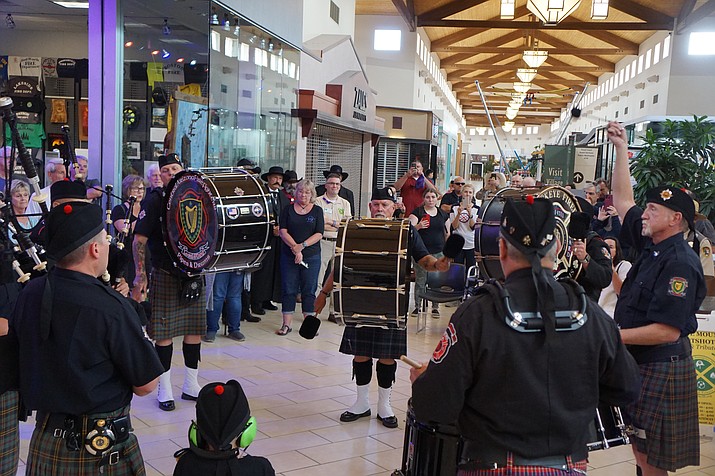 Members of the Central Arizona Pipes and Drums perform during the remembrance event on Wednesday, June 29, 2022, commemorating the nine-year mark of the Yarnell Hill Fire during which 19 members of the Granite Mountain Shot crew died fighting the fire, as well as the fourth year of the Granite Mountain Interagency Hotshot Crew Learning and Tribute Center at the Prescott Gateway Mall. (Cindy Barks/Courier)