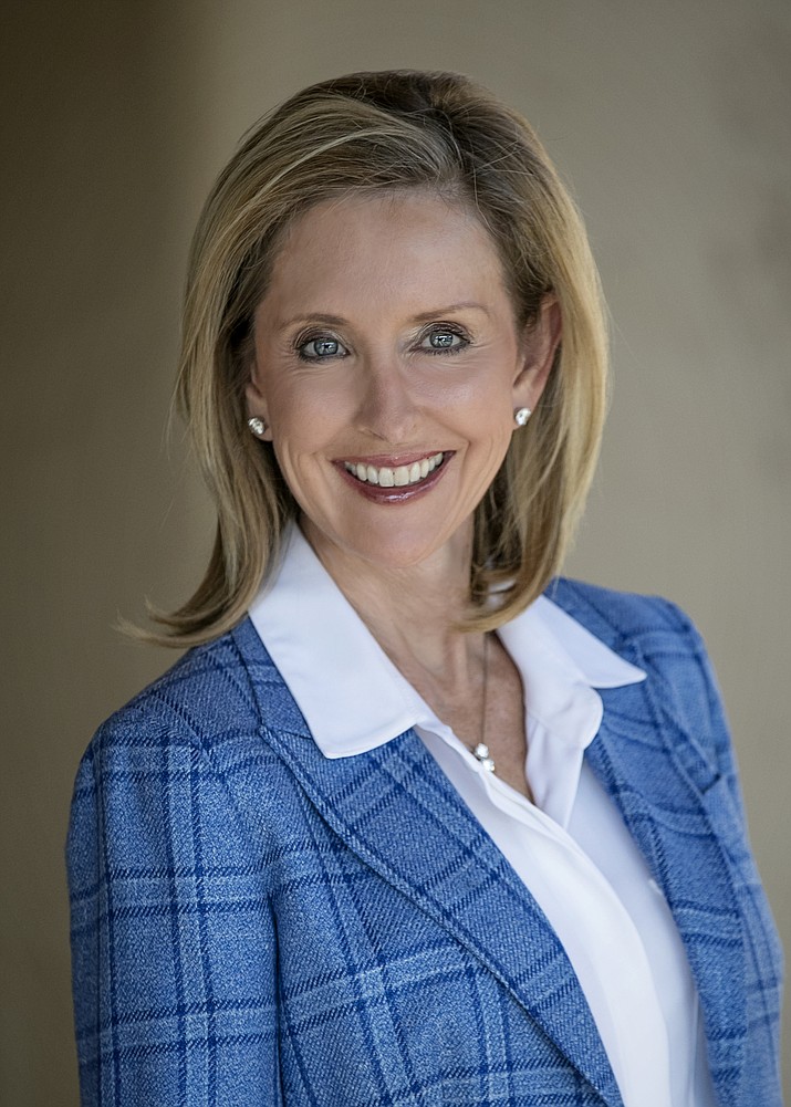 This undated photo provided by the Karrin for Arizona Campaign, shows Karrin Taylor Robson. Former U.S. Rep. Matt Salmon dropped out of the race for the Republican nomination for Arizona governor Tuesday, June 28, 2022, a move that comes a week before early ballots are mailed out and leaves just two top contenders in the GOP contest. Salmon was widely seen as trailing former TV news anchor Kari Lake and developer Karrin Taylor Robson. (Karrin For Arizona Campaign via AP)