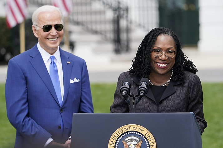 President Joe Biden listens as Judge Ketanji Brown Jackson speaks during an event on the South Lawn of the White House in Washington, April 8, 2022, celebrating the confirmation of Jackson as the first Black woman to reach the Supreme Court. The first Black woman confirmed for the Supreme Court, Jackson, is officially became a justice, sworn in Thursday, June 30, replacing Justice Stephen Breyer. (Andrew Harnik/AP, File)