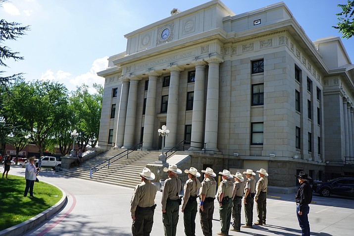 Several hundred people gathered on the Yavapai County Courthouse Plaza on Thursday, June 30, 2022 to remember the 19 Granite Mountain Hotshots who died fighting the Yarnell Hill Fire nine years ago. The June 30, 2013 tragedy was commemorated with the ringing of the courthouse bells 19 times, beginning at 4:42 p.m. While the gathering was intended as a silent moment of reflection and no public comments were made, a group of rangers with the Granite Mountain Company of the State of Arizona Rangers were on hand to stand at attention while the bells rang. Stan Herrera, captain of the group, said the Granite Mountain Company was formed three years ago to honor the Granite Mountain Hotshots.(Cindy Barks/Courier)