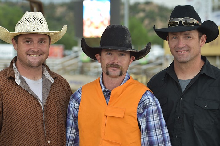 From left, the wild-horse racing team of Tanner Buntin, Ty Coglianese and T.C. Buntin at the 2022 Prescott Frontier Days Rodeo Monday night, June 27, 2022, at the Prescott Rodeo Grounds. (Jesse Bertel/Courier)