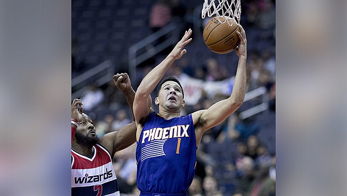 Star guard Devin Booker has received a four-year contract extension from the Phoenix Suns NBA franchise. (Photo by Keith Allison, cc-by-sa-2.0, https://bit.ly/3yaVeFT)