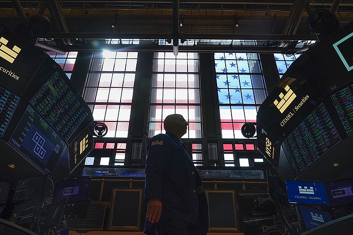 Traders work on the floor at the New York Stock Exchange in New York, Friday, July 1, 2022.Stocks shook off a morning slump and ended higher Friday, but not enough to erase their losses for the week.  (Seth Wenig/AP)