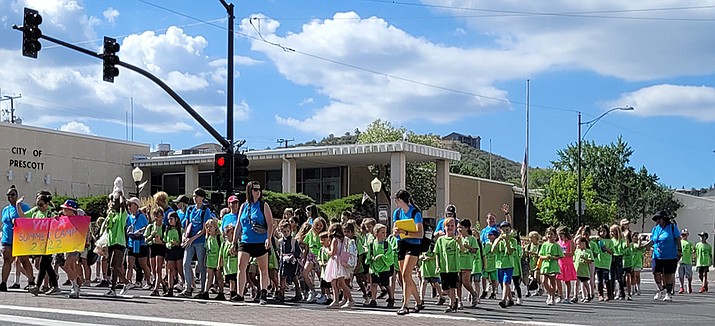Children march in the annual Kiwanis Kiddie Parade in Prescott Friday morning, July 1, 2022 as part of Rodeo Week. (Tom Staples/Courier)
