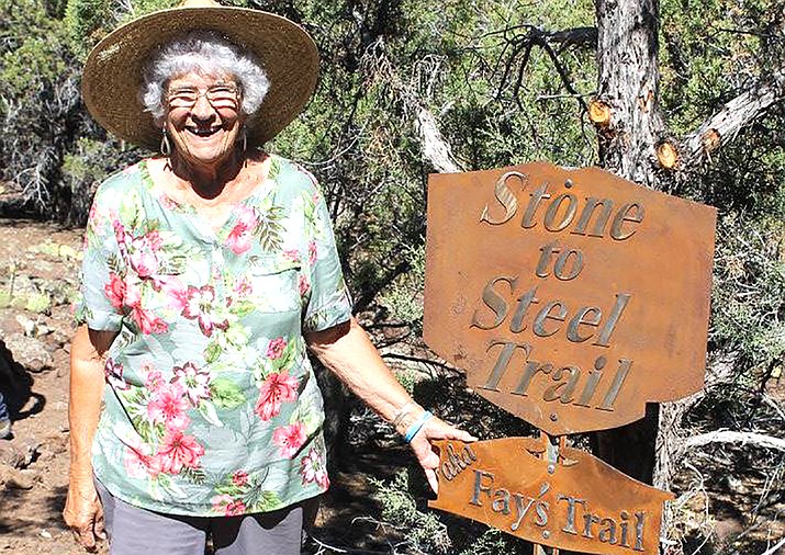 Fayrene Hume stands next to a trailhead near the Stone to Steel Dam dedicated to her 2016. Hume has dedicated her life to helping improve and preserve Ash Fork history and the culture of the west. (Photo/Ash Fork Historical Society)