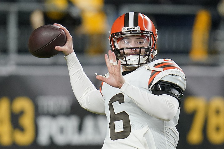 Cleveland Browns quarterback Baker Mayfield (6) warms up before an NFL football game against the Pittsburgh Steelers, on Jan. 3, 2022, in Pittsburgh. Mayfield's rocky run with Cleveland officially ended Wednesday, July 6, 2022, with the Browns trading the divisive quarterback and former No. 1 overall draft pick to the Carolina Panthers, a person familiar with the deal told the Associated Press. (Gene J. Puskar, AP File)