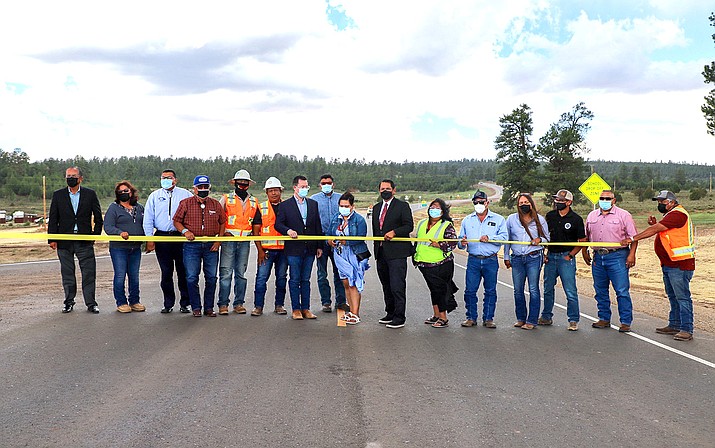 Community residents in Tsaile/Wheatfields celebrate the completion of Navajo Route 12, a road used by residents, Diné College students and first responders. (Photo/OPVP)