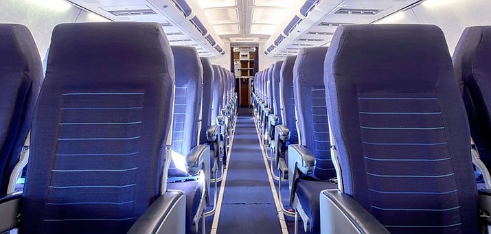 Where should you sit on an airplane? (Courier stock image)