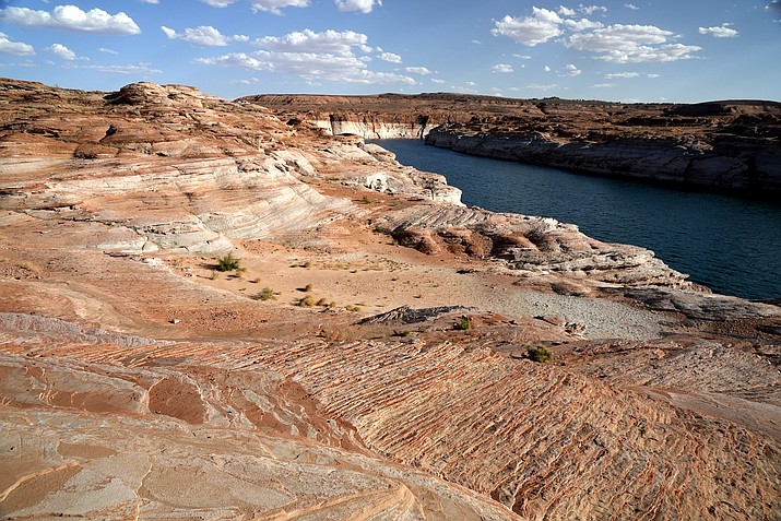 Bathtub rings show how low Lake Powell levels have dropped this year. (AP Photo/Brittany Peterson)