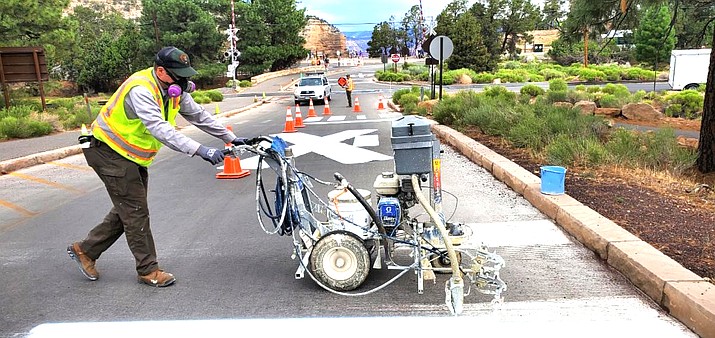 Over the last few weeks, NPS roads crew have been re-striping roadways within the Grand Canyon residential and visitor areas. (NPS/photo)