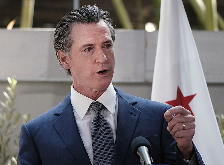 California Governor Gavin Newsom answers questions at a news conference in Los Angeles, on June 9, 2022. The governor wants an explanation from UCLA officials about their move to the Big Ten Conference. (Richard Vogel, AP File)