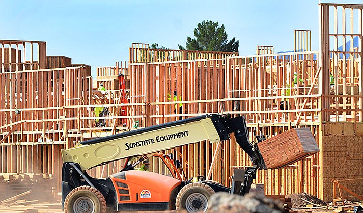 The aroma of freshly cut lumber is filling the hot desert air surrounding the 192-unit Inspiration apartment project in Cottonwood. (VVN/Vyto Starinskas)