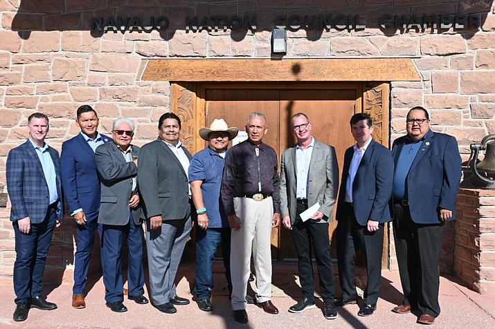 Members of the Navajo Nation Council and representatives from Arcadian Intracom present first revenue shared check.  (Photo/Navajo Nation Council)