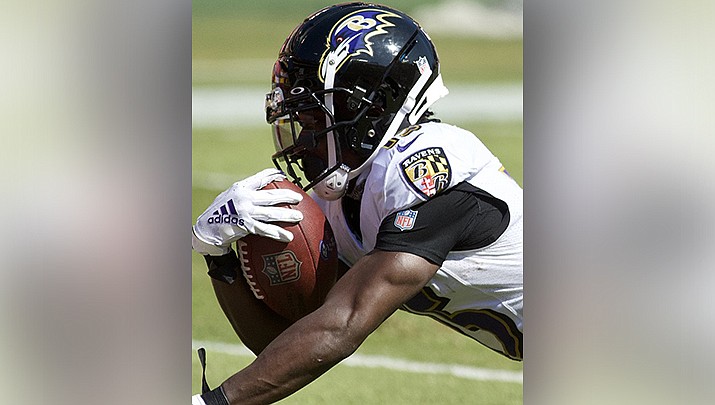 The Arizona Cardinals have placed receiver Marquise Brown on the NFL’s active/non-football injury list because of a hamstring issue. Brown is shown in action last season with the Baltimore Ravens.  (Photo by All-Pro Reels, cc-by-sa-2.0, https://bit.ly/3J7wxiU)