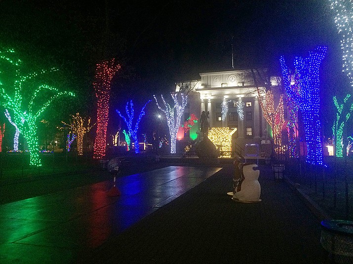 The Yavapai County Courthouse plaza and the trees that surround it are decorated with Christmas lights in this January 2021 photo. (Courier file