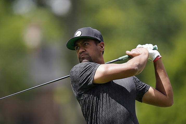 Tony Finau drives off the second tee during the third round of the Rocket Mortgage Classic golf tournament, Saturday, July 30, 2022, in Detroit. (Carlos Osorio/AP)