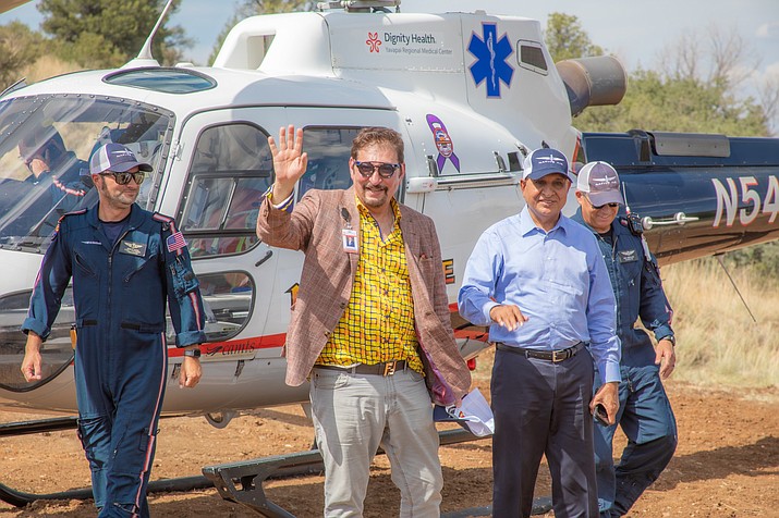 Exceptional Health Chief Executive Officer Saeed Mahboubi and Dr. Munir Ahmad, president of Exceptional Healthcare, arrive to the ceremony via Native Air. Mahboubi waves. (Exceptional Health/Courtesy)