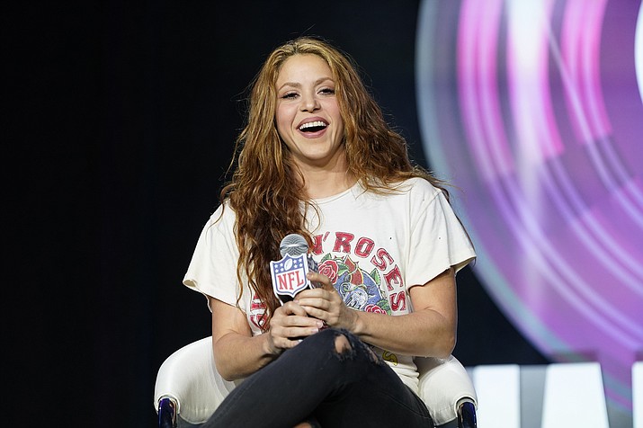 Performer Shakira answers questions at a news conference on Jan. 30, 2020, in Miami. Spanish prosecutors are seeking a prison sentence of eight years for Colombian-born pop star Shakira in her expected trial for alleged tax fraud. Shakira is charged for failing to pay 14,5 million euros ($15 million) in taxes in Spain between 2012 and 2014. Prosecutors say the singer lived in Spain for more than half of each of those years and should have therefore paid her taxes in the country. (David J. Phillip/AP, File)
