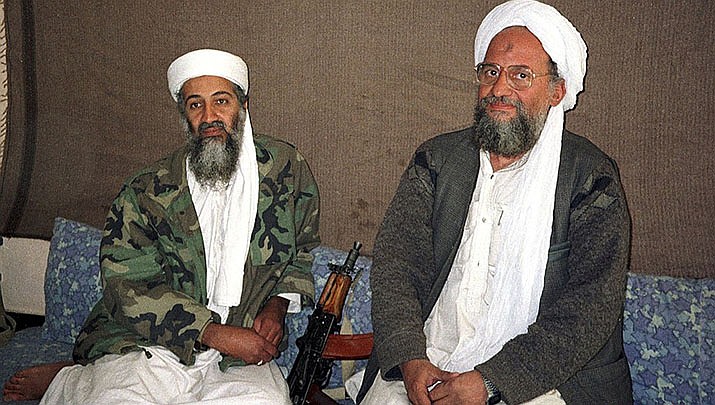 The U.S. used a drone strike to kill Dr. Ayman al-Zawahri, the leader of al-Qaida, in Kabul, Afghanistan, He is shown on the right sitting next to then al-Qaida leader Osama bin Laden during a 2001 interview with a Pakistani journalist. (Photo by Hamid Mir, cc-by-sa-3.0, https://bit.ly/3Jrey6Z)
