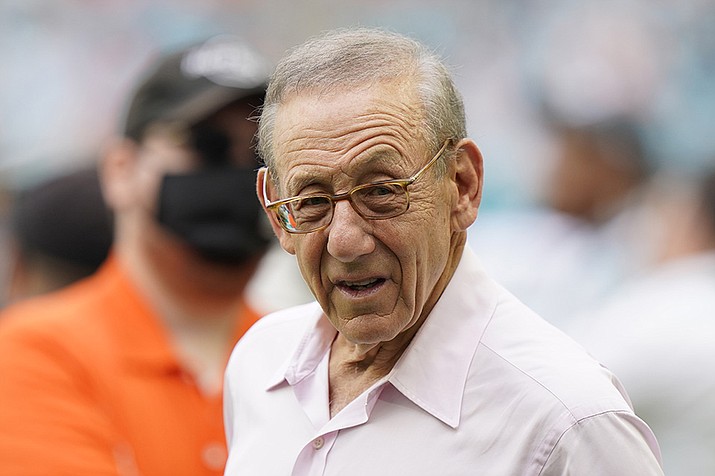 Miami Dolphins owner Stephen Ross gestures at the end of an NFL football game against the Atlanta Falcons, on Oct. 24, 2021, in Miami Gardens, Fla. The NFL has suspended Miami Dolphins owner Stephen Ross and fined him $1.5 million for tampering with Tom Brady and Sean Payton following a six-month investigation stemming from Brian Flores' racial discrimination lawsuit against the league. (AP Photo/Wilfredo Lee, FIle)