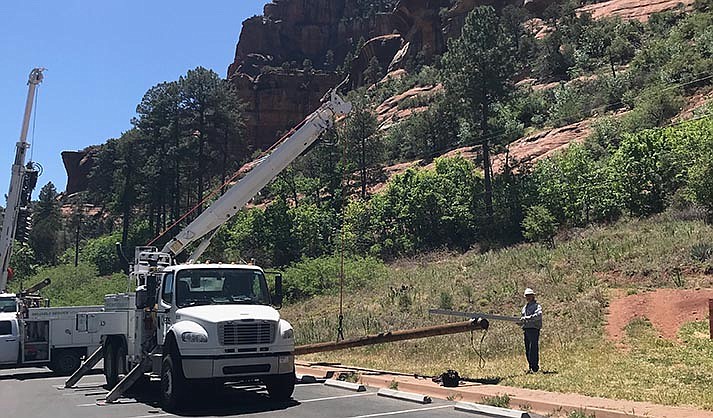 APS maintenance crews at work.  (Courtesy of Mackenzie Rodgers, Northern Arizona Division director, APS)