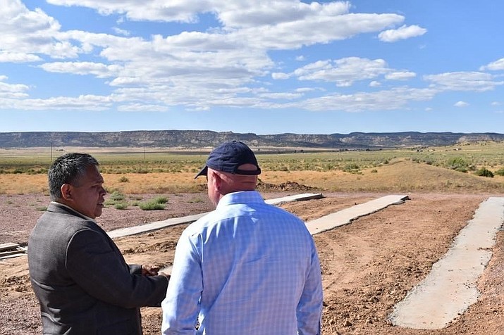 Navajo Nation Council Delegate Kee Allen Begay, Jr. and Arizona Senator Mark Kelly tour a site for future cell tower development. (Photo/Navajo Nation Council)
