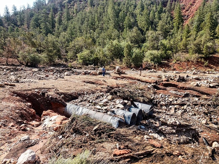 Monsoon storm-related flash flooding, debris flows, and erosion on Forest Roads 22 and 462 in the Mangum Fire area in 2021. (Photo/USFS)
