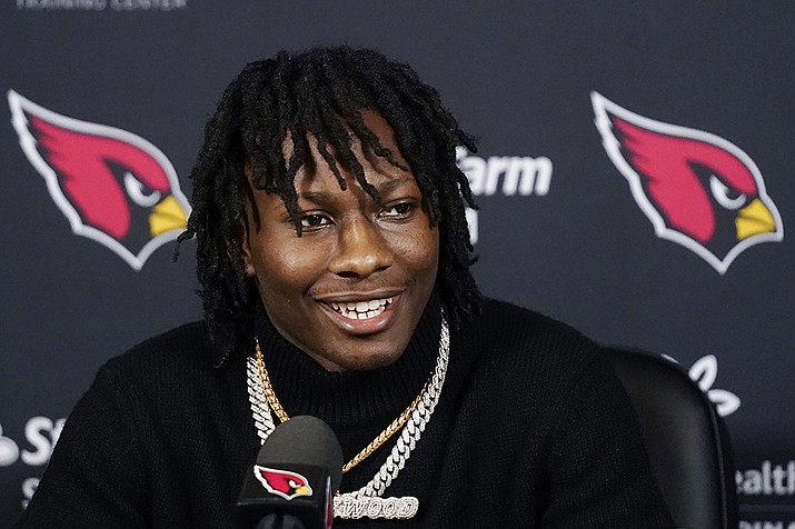 Arizona Cardinals new wide receiver Marquise Brown answers a question during a news conference at the NFL football team training facility on April 29, 2022, in Tempe. Brown was arrested and charged with criminal speeding on Wednesday morning. (Ross D. Franklin, AP File)